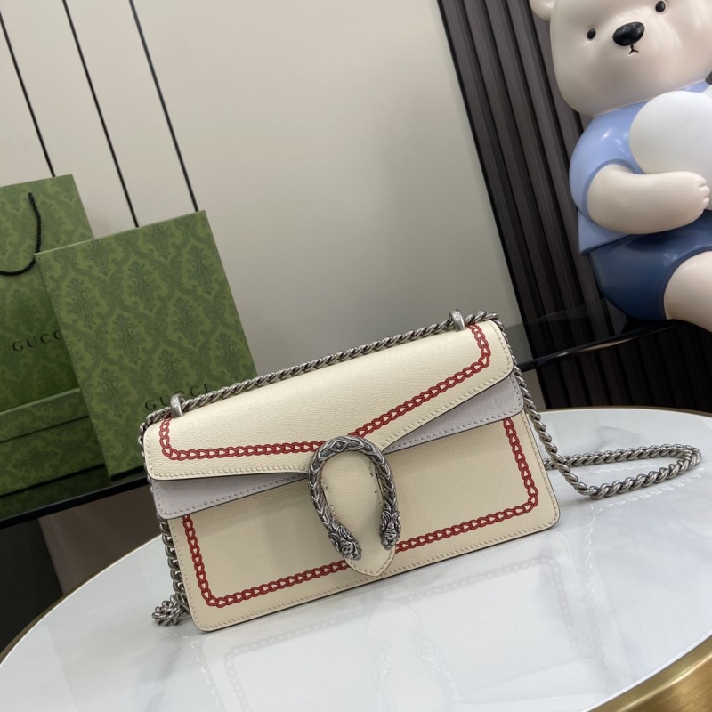 G*u*i satchel bags